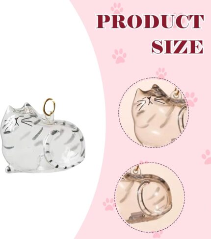 Transparent cat-shaped keychain with a small amount of pet fur visible inside, attached to a split ring.