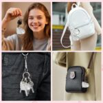 Transparent cat-shaped keychain with a small amount of pet fur visible inside, attached to a split ring.