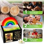 A black wooden pet urn with a rainbow bridge sculpture, a photo frame displaying a pet, and a personalized name tag.