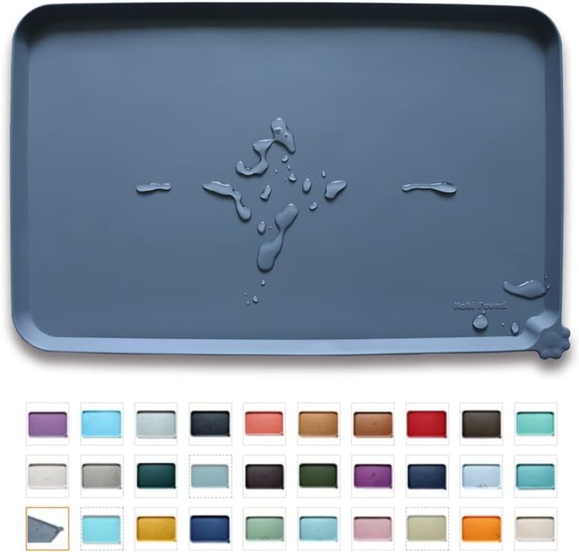 Gray Hoki Found waterproof silicone pet feeding mat with raised edges, suitable for dog and cat food bowls.