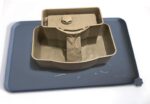 Gray Hoki Found waterproof silicone pet feeding mat with raised edges, suitable for dog and cat food bowls.