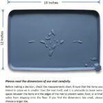 Gray Hoki Found waterproof silicone pet feeding mat with raised edges, suitable for dog and cat food bowls.