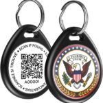 Close-up of a round, black ILFINDYOU QR code pet ID tag with an eagle design, attached to a dog collar.