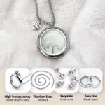 Silvery circular glass and metal necklace with a cat charm, designed to hold pet ashes or fur as a memorial.