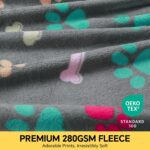 Three Luciphia small fleece pet blankets in grey, brown, and blue with paw prints, folded neatly.