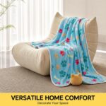 Three Luciphia small fleece pet blankets in grey, brown, and blue with paw prints, folded neatly.
