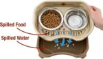 A cappuccino-colored Neater Feeder Express elevated dog bowl stand with two stainless steel bowls filled with food and water.