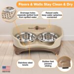 A cappuccino-colored Neater Feeder Express elevated dog bowl stand with two stainless steel bowls filled with food and water.