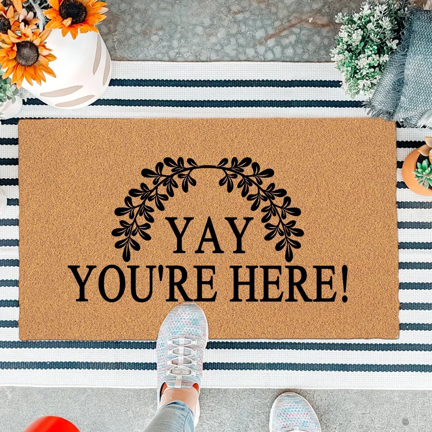 potayouhen-funny-welcome-doormat-yay-youre-here-non-slip-indoor-entrance-mat-30x18-inches-01 A colorful rectangular doormat with the humorous text "Yay You're Here!" in bold letters, set against a bright background.